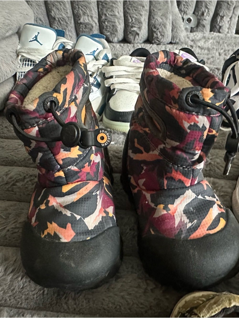 Bogs Kids Winter Boots in Black, Pink, Orange and Purple Camo